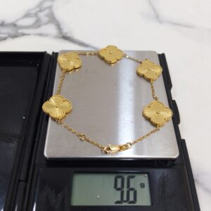 Best Gold Vendor in Nigeria; 9.6g 18K yellow gold Van Cleef style 5-motif Alhambra bracelet 8.5 inches on a scale
