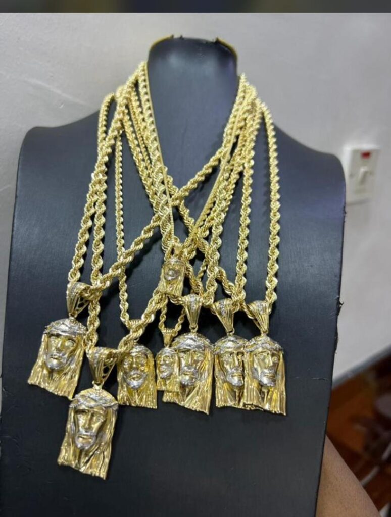 18K solid yellow gold rope chains with two-tone Jesus piece pendants displayed at MK Gold in Lagos Nigeria.
