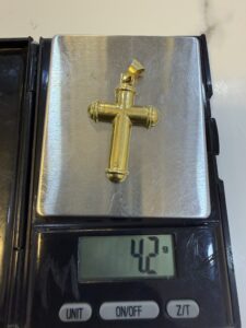 18 Karat Gold Cross Pendant 