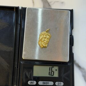 18 Karat Gold Jesus Face Pendant 1.6g