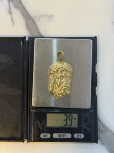 18 Karat Gold Jesus Face Pendant 3.9g